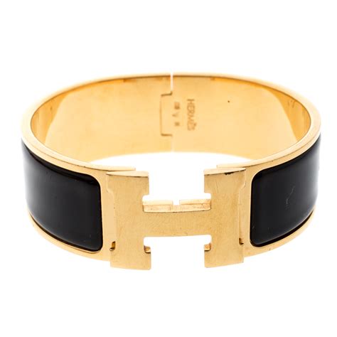 hermes cuff bracelet black and gold|hermes cuff bracelet price.